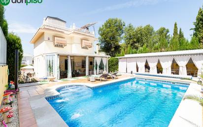 Swimming pool of House or chalet for sale in Albolote  with Air Conditioner, Heating and Private garden