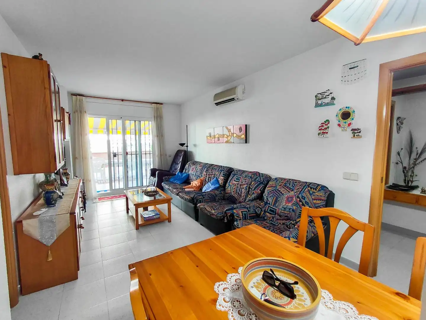 Living room of Ground floor for sale in Cunit  with Air Conditioner, Private garden and Terrace