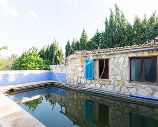 Swimming pool of Single-family semi-detached for sale in Pollença  with Air Conditioner, Heating and Private garden