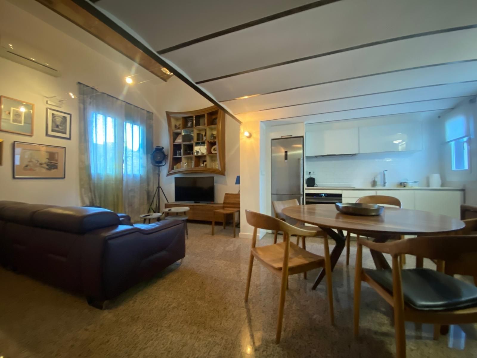 Sala d'estar de Estudi de lloguer en  Barcelona Capital amb Aire condicionat i Calefacció
