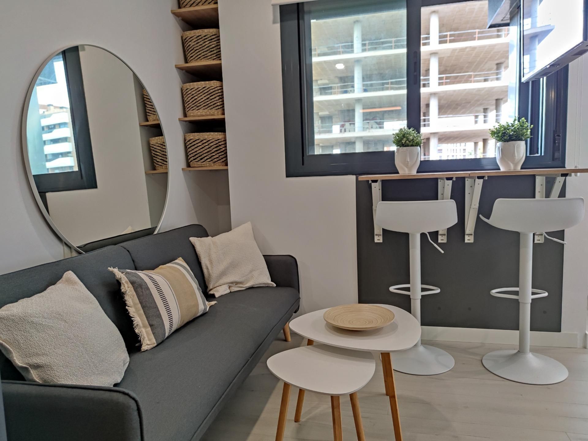 Sala d'estar de Estudi de lloguer en  Murcia Capital amb Aire condicionat i Calefacció