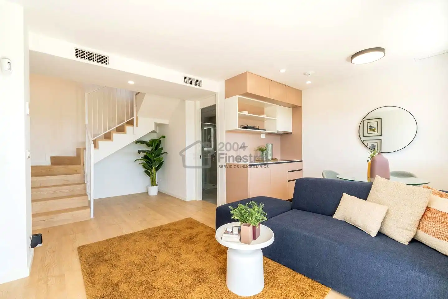 Sala de estar de Casa adosada en venta en La Nucia con Aire acondicionado, Jardín privado y Terraza