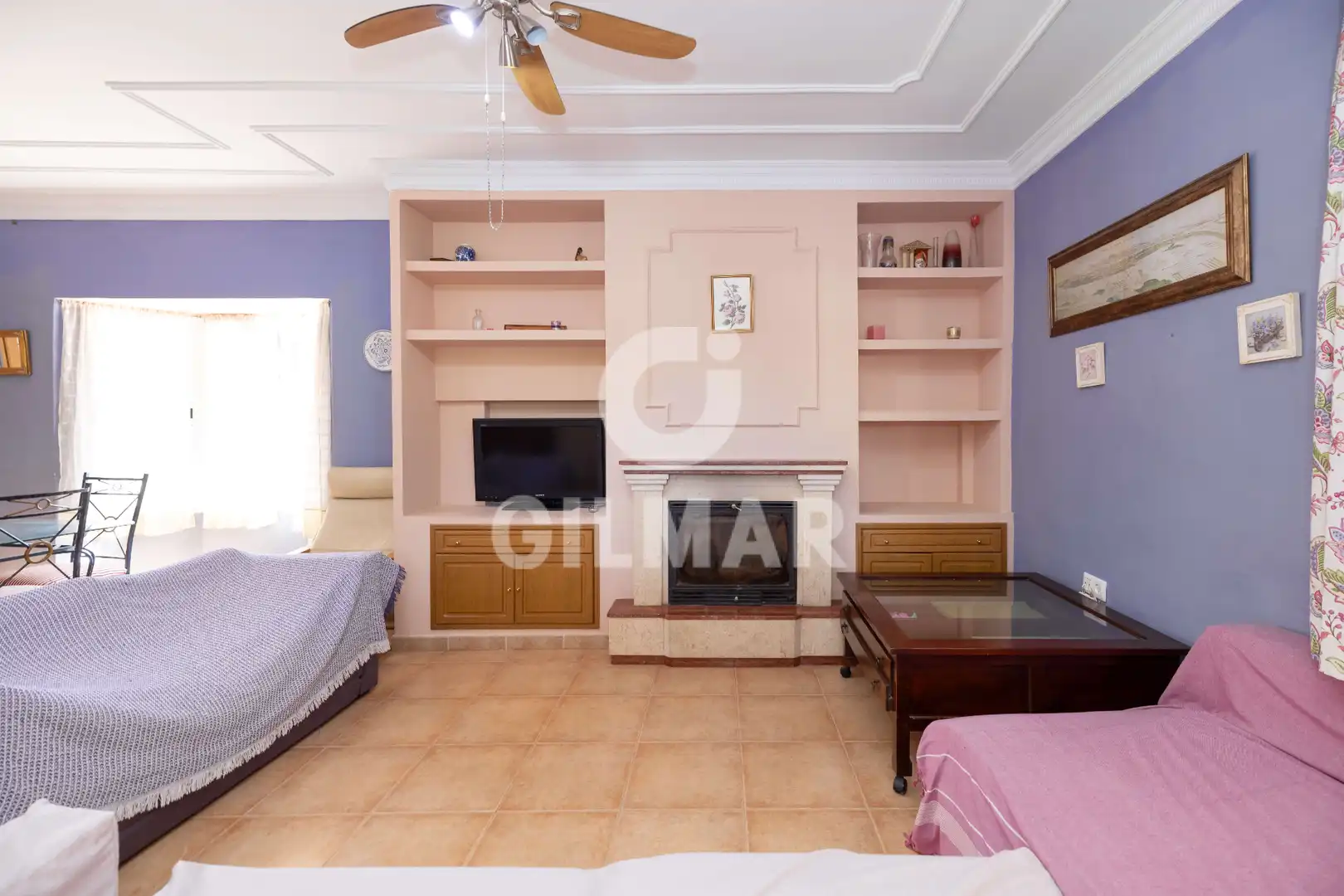 Sala d'estar de Casa o xalet de lloguer en El Puerto de Santa María amb Aire condicionat, Jardí privat i Piscina