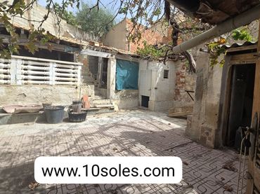 Maison mitoyenne avec jardin à vendre à Bigastro