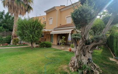 Vista exterior de Casa adosada en venda en Puçol amb Aire condicionat, Jardí privat i Terrassa