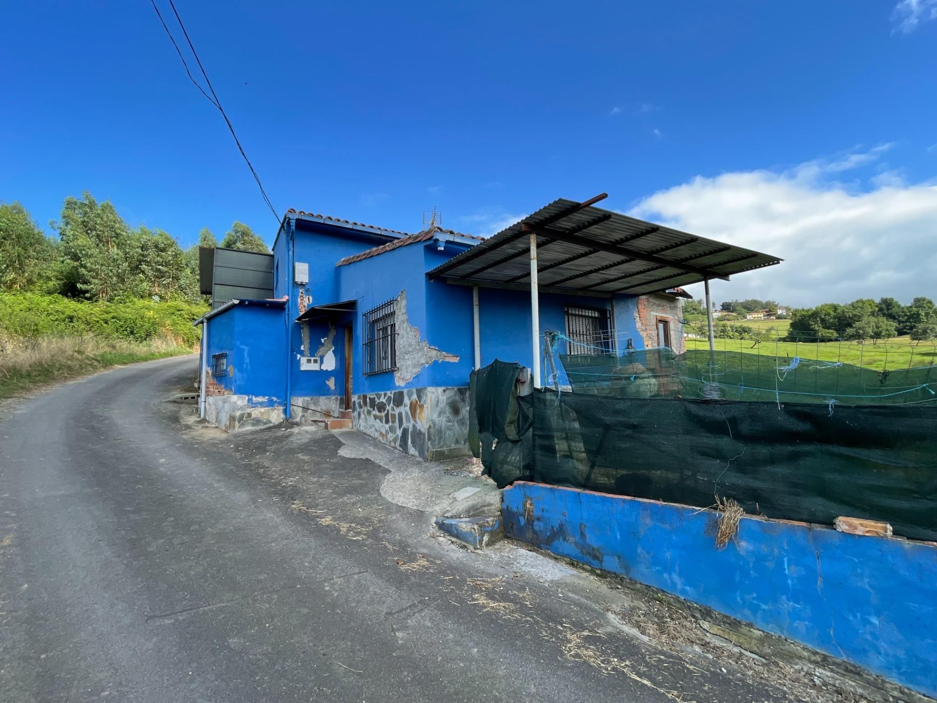 Vista exterior de Casa o xalet en venda en Grado amb Jardí privat, Terrassa i Traster