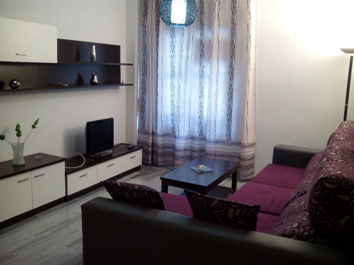 Sala d'estar de Apartament de lloguer en  Huelva Capital amb Terrassa i Moblat