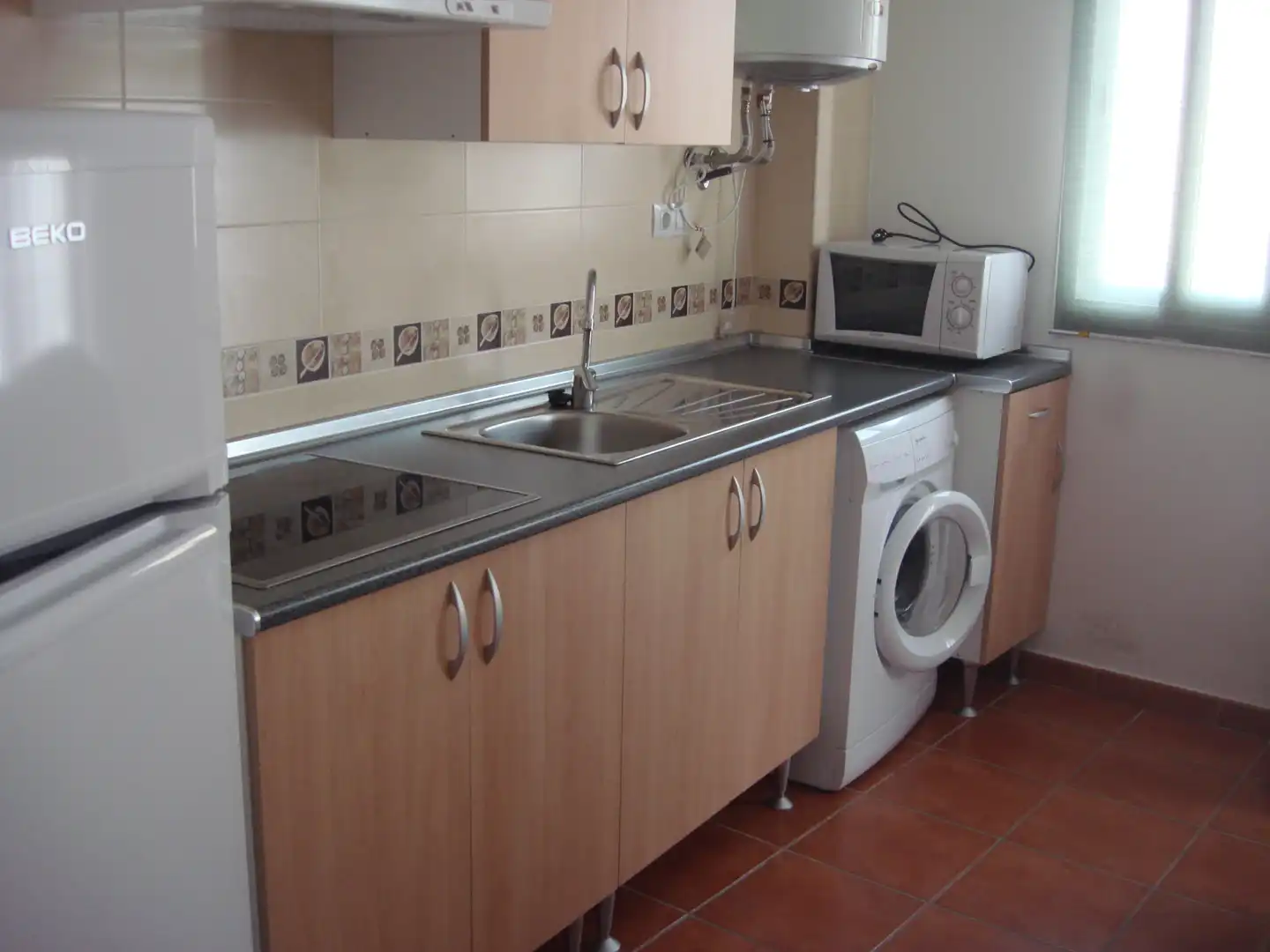 Kitchen of Apartments for sale in Málaga  with Air Conditioner, Furnished and Washing machine
