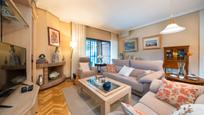 Living room of Single-family semi-detached for sale in  Madrid Capital  with Air Conditioner, Terrace and Swimming Pool