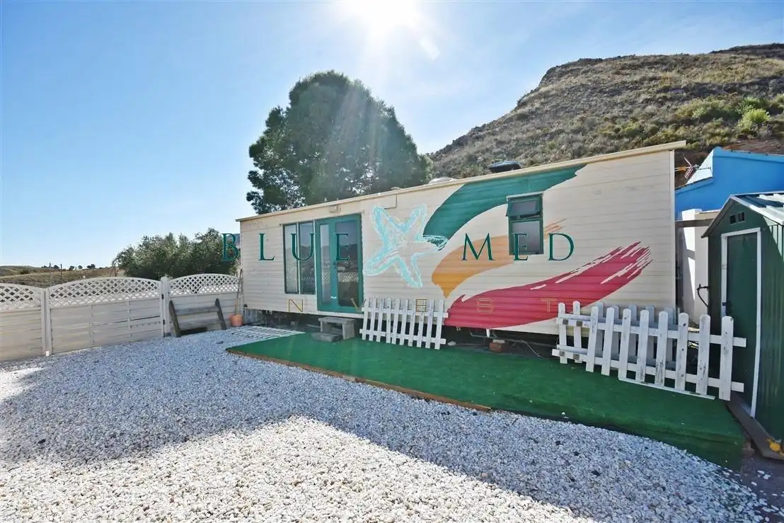 Vista exterior de Casa o xalet en venda en Mazarrón amb Jardí privat, Piscina i Moblat