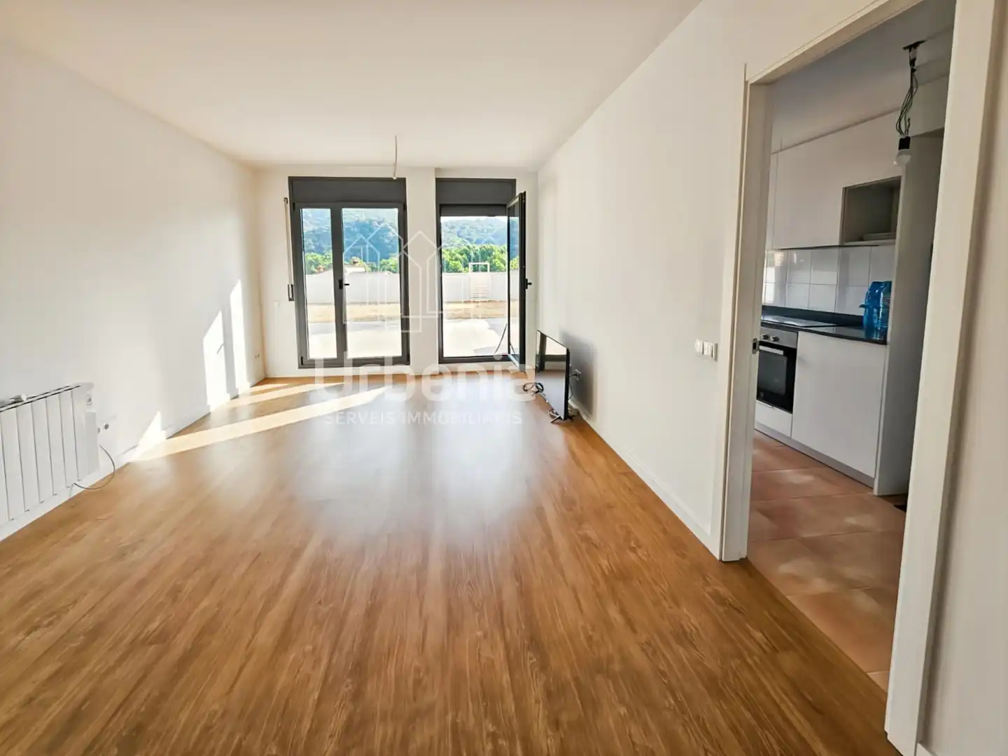 Sala d'estar de Pis en venda en Sant Iscle de Vallalta amb Calefacció, Jardí privat i Terrassa