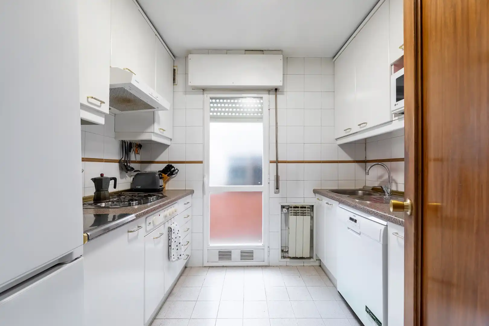 Cocina de Casa adosada en venta en Pozuelo de Alarcón con Aire acondicionado, Calefacción y Jardín privado