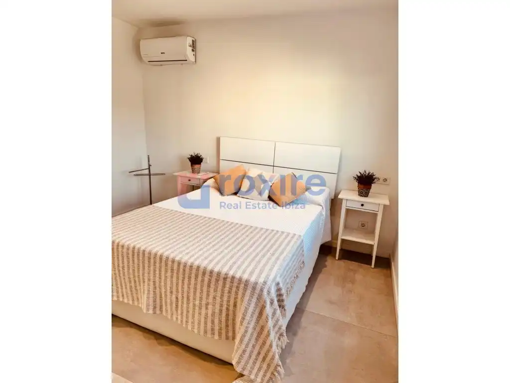 Dormitori de Dúplex de lloguer en Sant Josep de sa Talaia amb Aire condicionat, Jardí privat i Terrassa