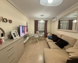 Living room of Flat for sale in Roquetas de Mar