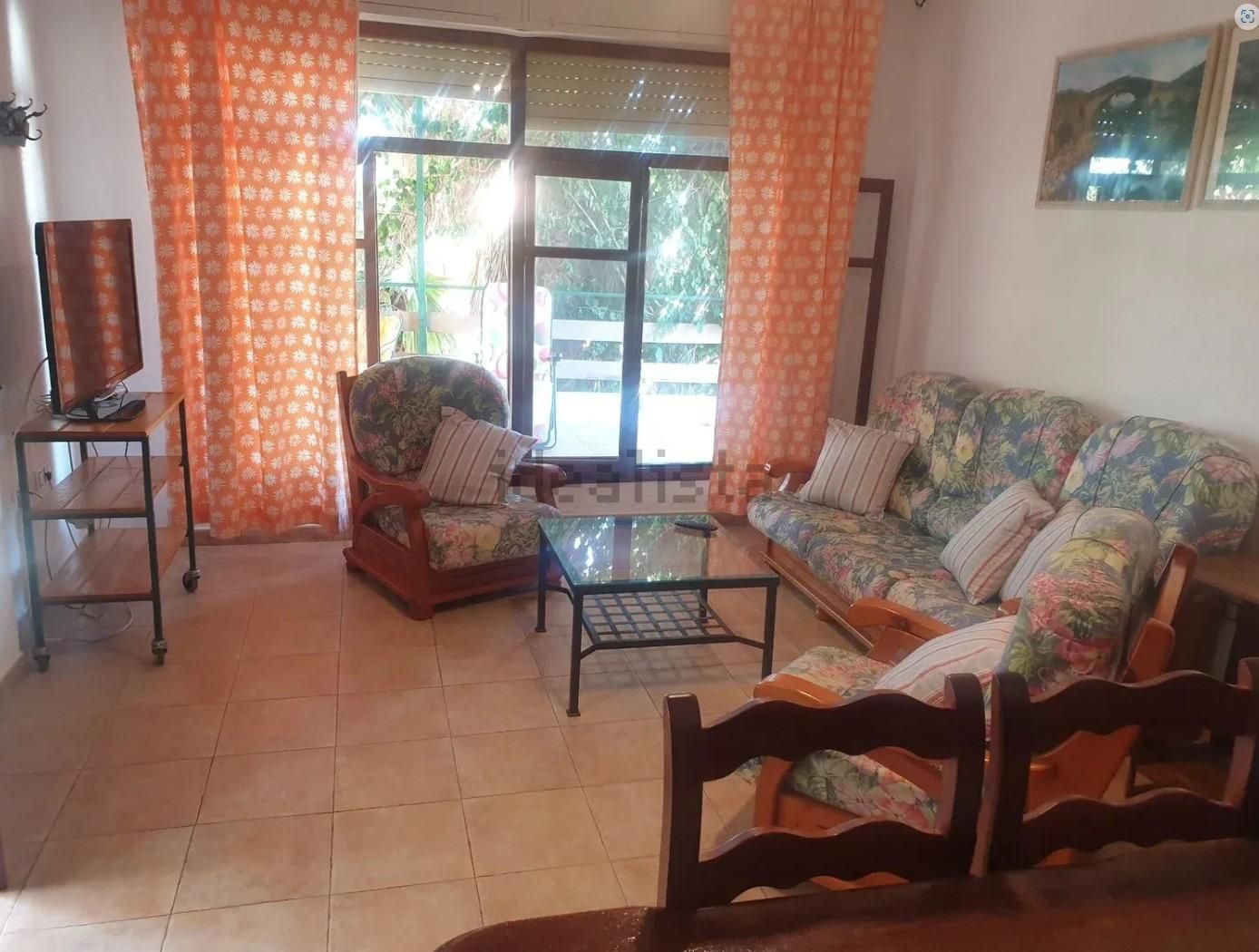 Sala d'estar de Casa o xalet en venda en Pulpí amb Aire condicionat, Jardí privat i Terrassa