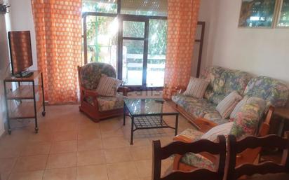 Sala d'estar de Casa o xalet en venda en Pulpí amb Aire condicionat, Jardí privat i Terrassa