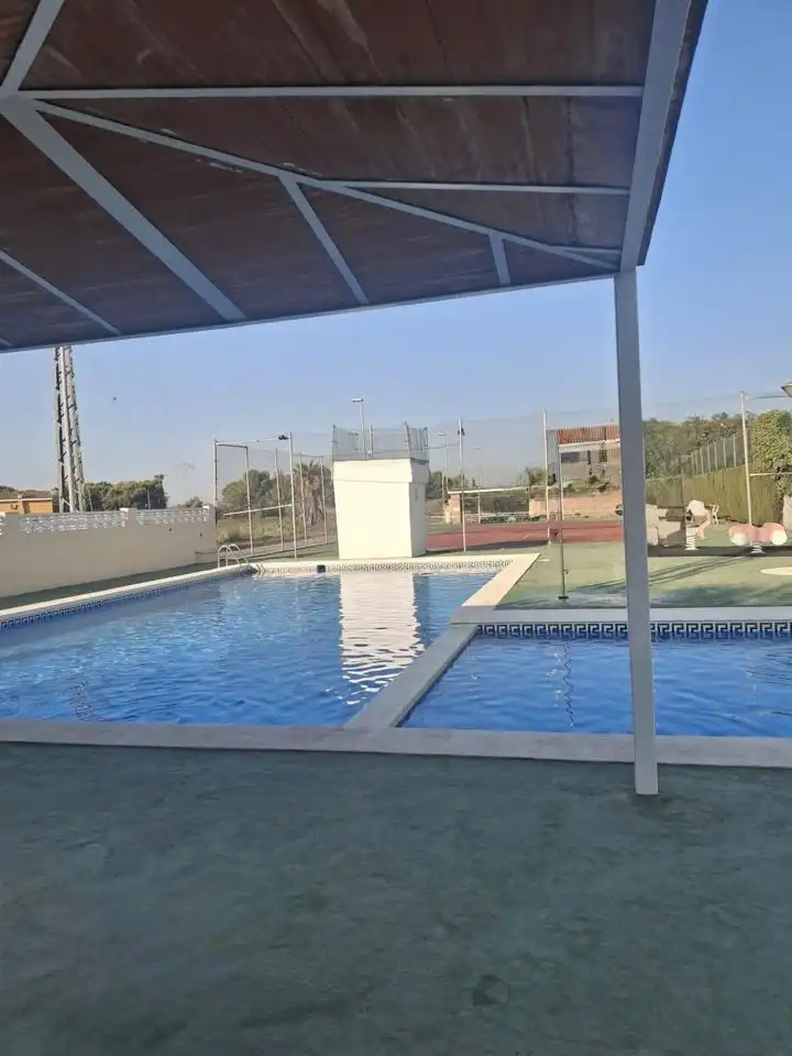 Piscina de Casa adosada en venda en Benicasim / Benicàssim amb Aire condicionat, Jardí privat i Terrassa