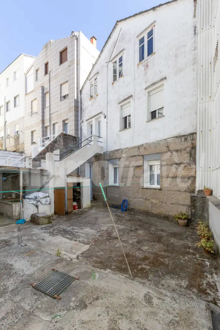 Vista exterior de Casa adosada en venda en Sanxenxo amb Terrassa, Moblat i Forn