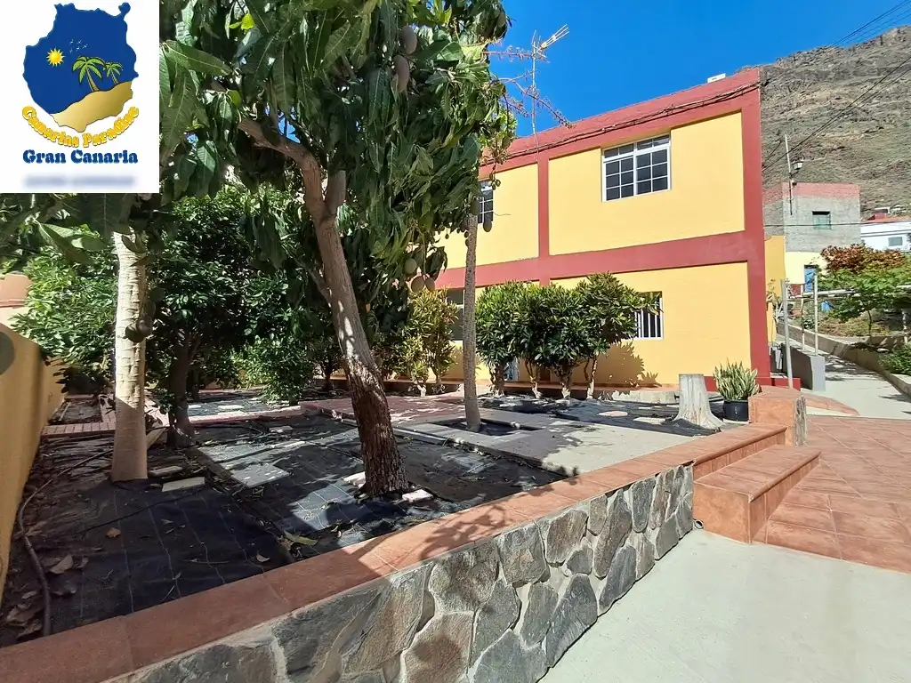 Außenansicht von Wohnung zum Verkauf in Mogán mit Privatgarten und Terrasse