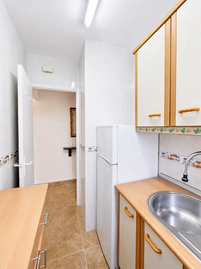 Cuina de Apartament en venda en Benalmádena amb Aire condicionat, Terrassa i Moblat