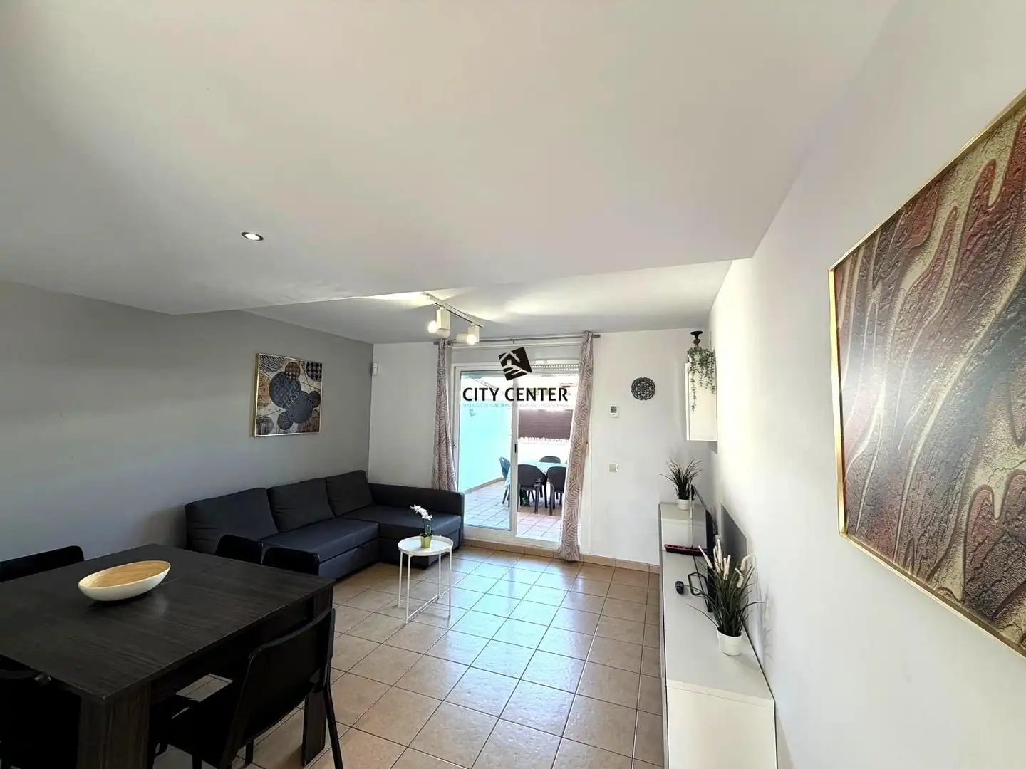 Sala d'estar de Casa adosada en venda en Adeje amb Aire condicionat, Terrassa i Traster