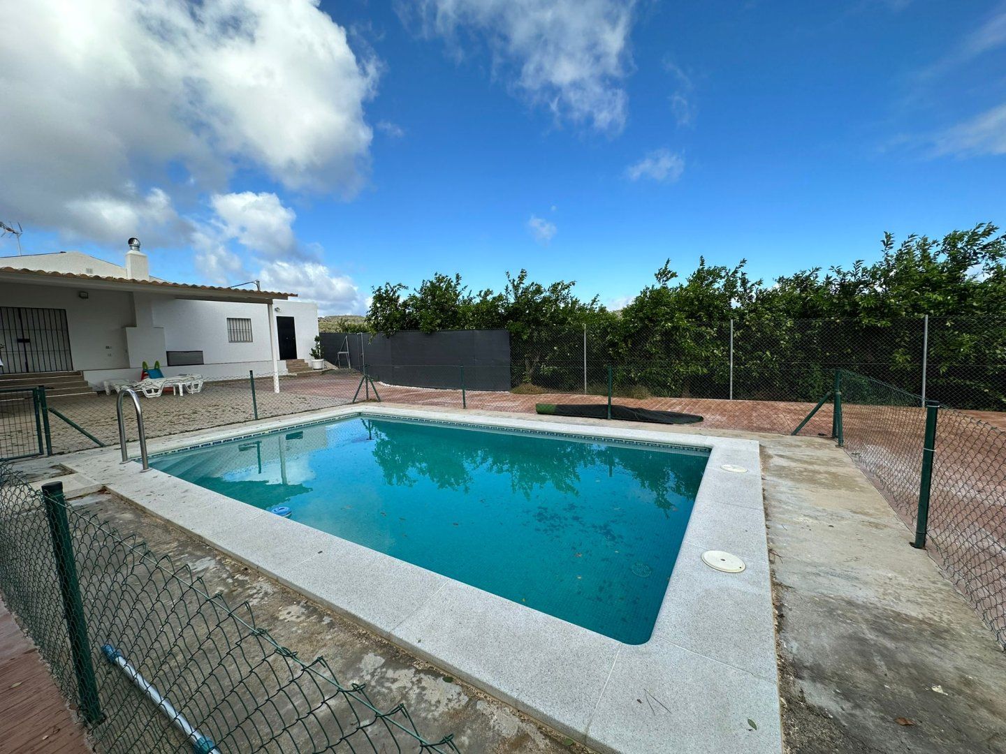 Swimming pool of Flat for sale in Lora del Río  with Air Conditioner, Heating and Swimming Pool