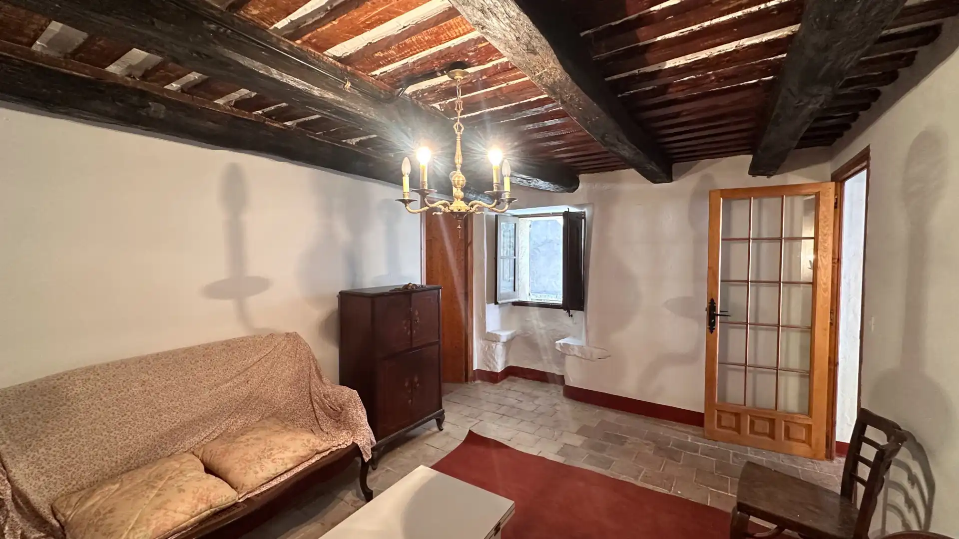 Sala d'estar de Casa adosada en venda en Vidrà amb Traster, Moblat i Forn