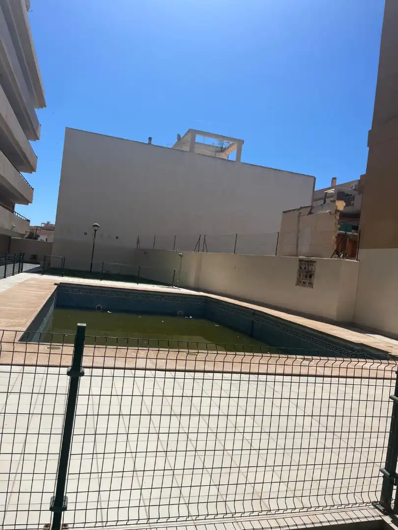 Swimming pool of Flat for sale in Roquetas de Mar  with Air Conditioner, Heating and Private garden