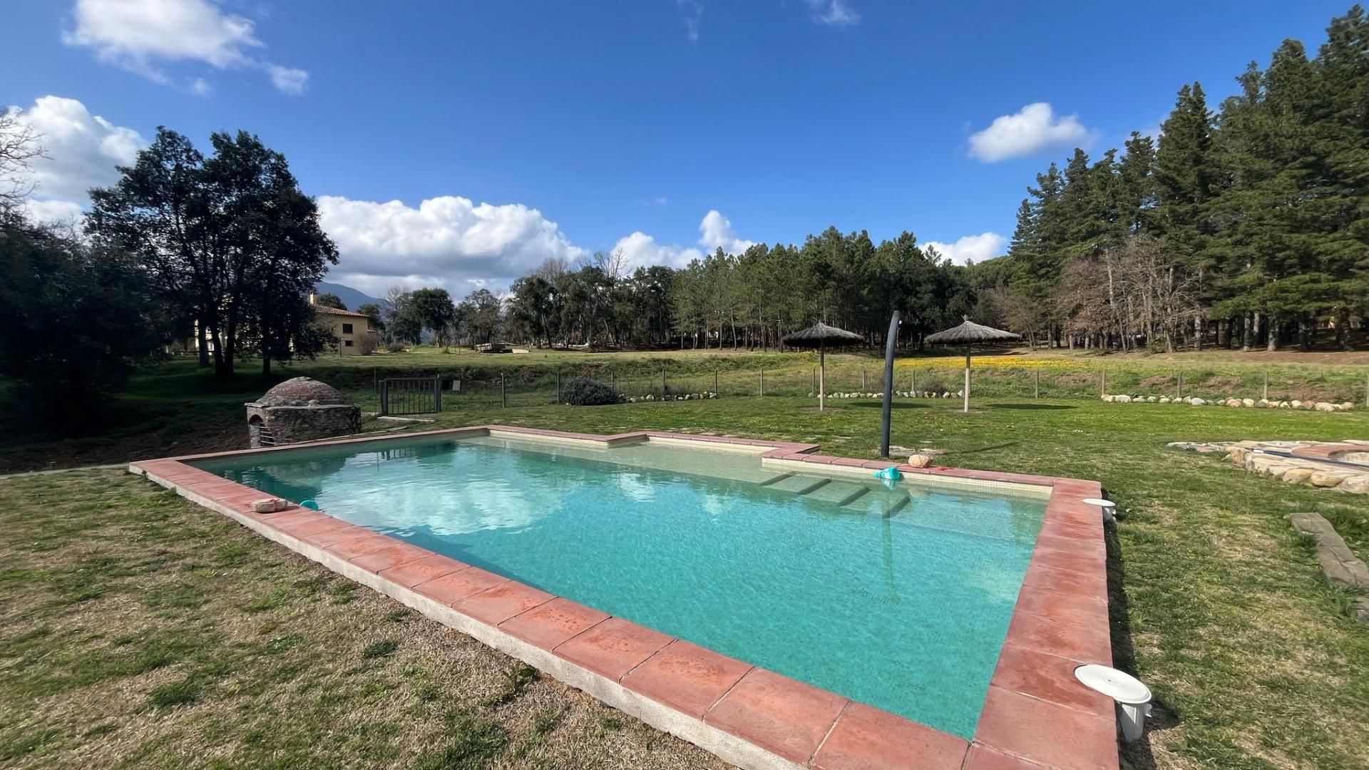 Swimming pool of Country house to rent in Sant Feliu de Buixalleu  with Heating