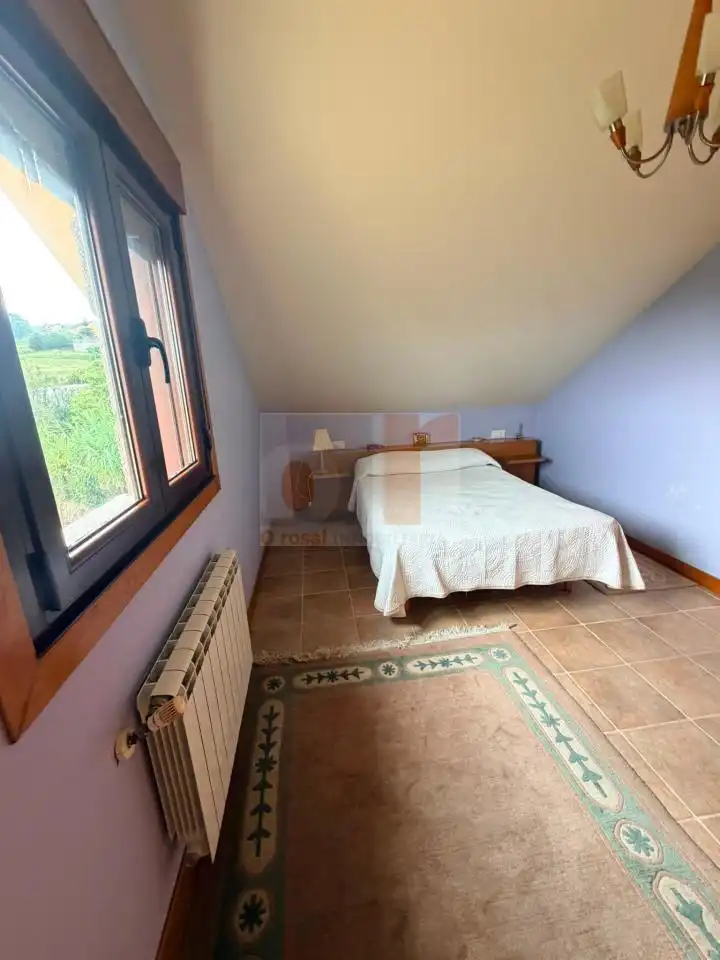 Dormitori de Casa o xalet de lloguer en Moaña amb Calefacció, Jardí privat i Terrassa