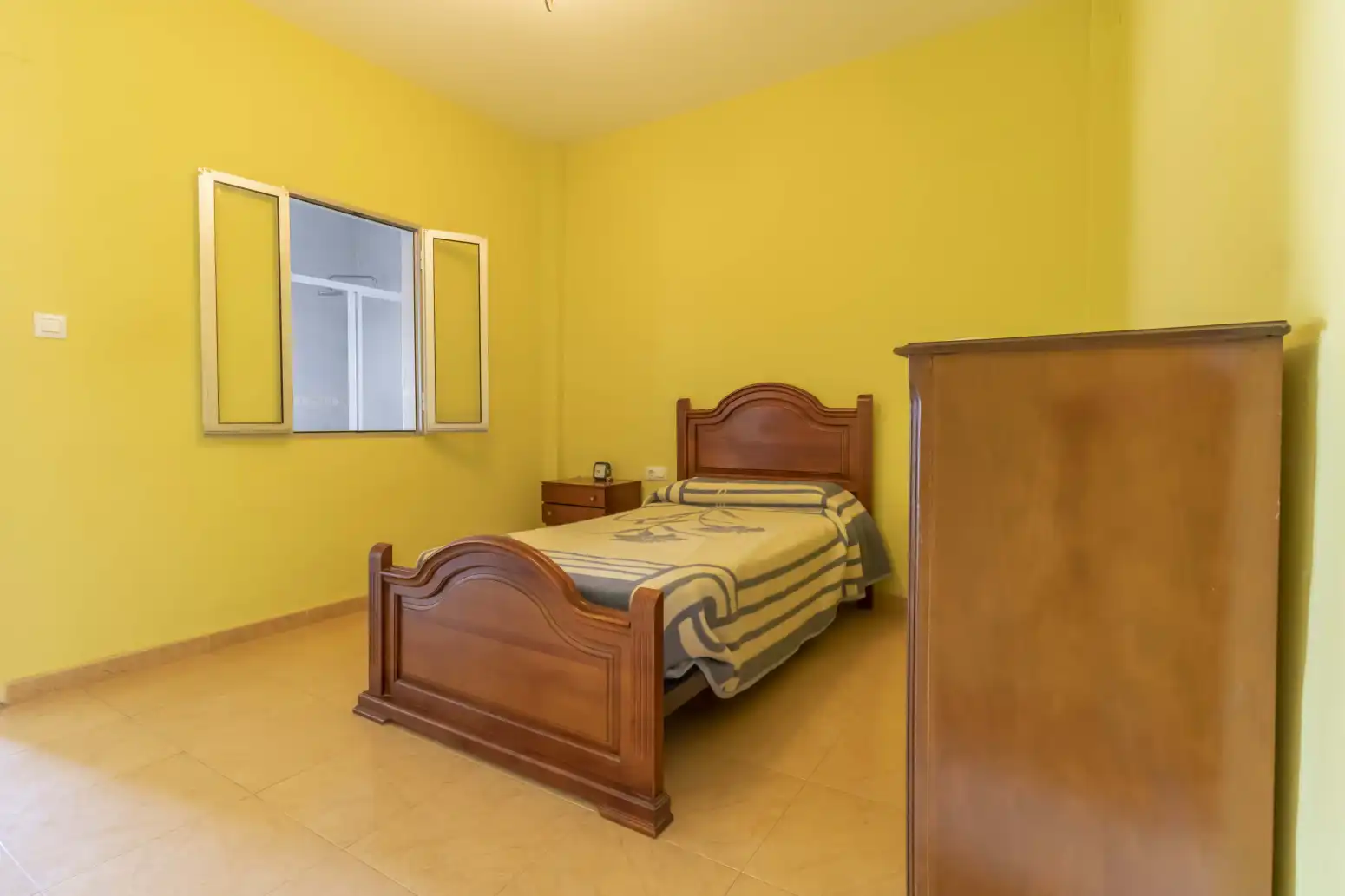 Habitación de Casa adosada en venta en Sevilla con Aire acondicionado