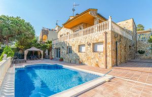 Swimming pool of Single-family semi-detached for sale in Palafolls  with Heating, Private garden and Community pool