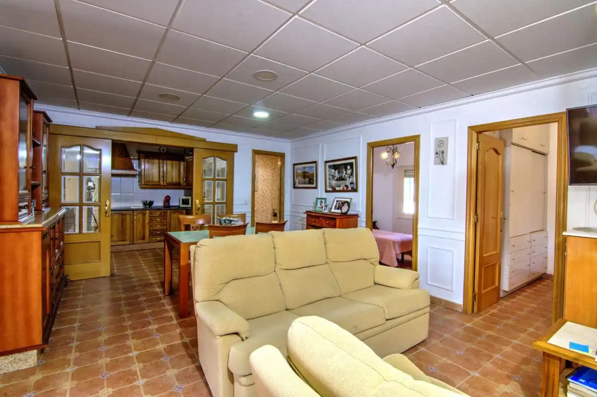 Sala d'estar de Casa o xalet en venda en Alicante / Alacant amb Aire condicionat, Calefacció i Jardí privat