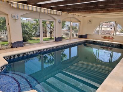 Swimming pool of Single-family semi-detached for sale in Empuriabrava  with Air Conditioner, Terrace and Swimming Pool