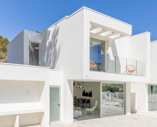 Exterior view of Single-family semi-detached for sale in Moraira  with Air Conditioner, Terrace and Swimming Pool