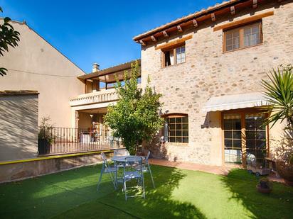 Außenansicht von Einfamilien-Reihenhaus zum verkauf in Medinyà mit Klimaanlage und Terrasse