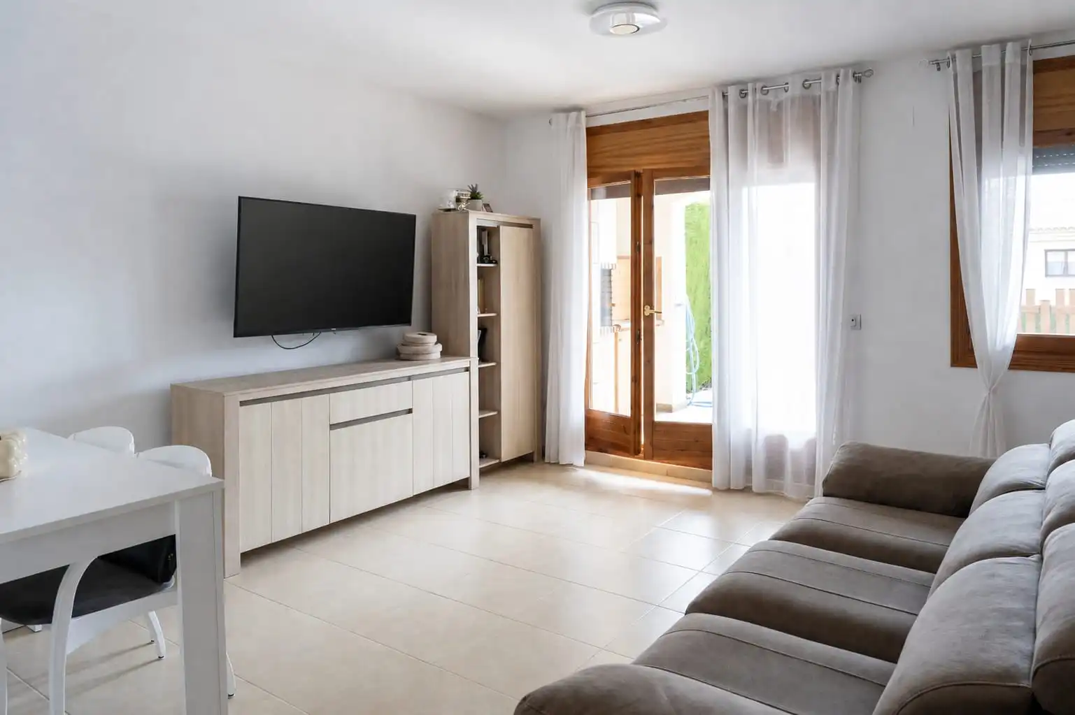Sala de estar de Casa adosada en venta en Mont-roig del Camp con Aire acondicionado, Jardín privado y Terraza
