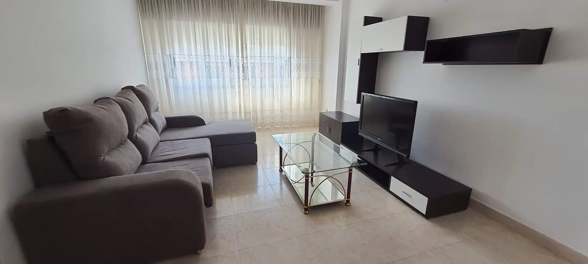 Living room of Flat for rent in Carballo  with Heating, Parquet flooring and Furnished
