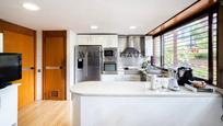 Kitchen of Single-family semi-detached for sale in  Madrid Capital  with Air Conditioner, Heating and Private garden