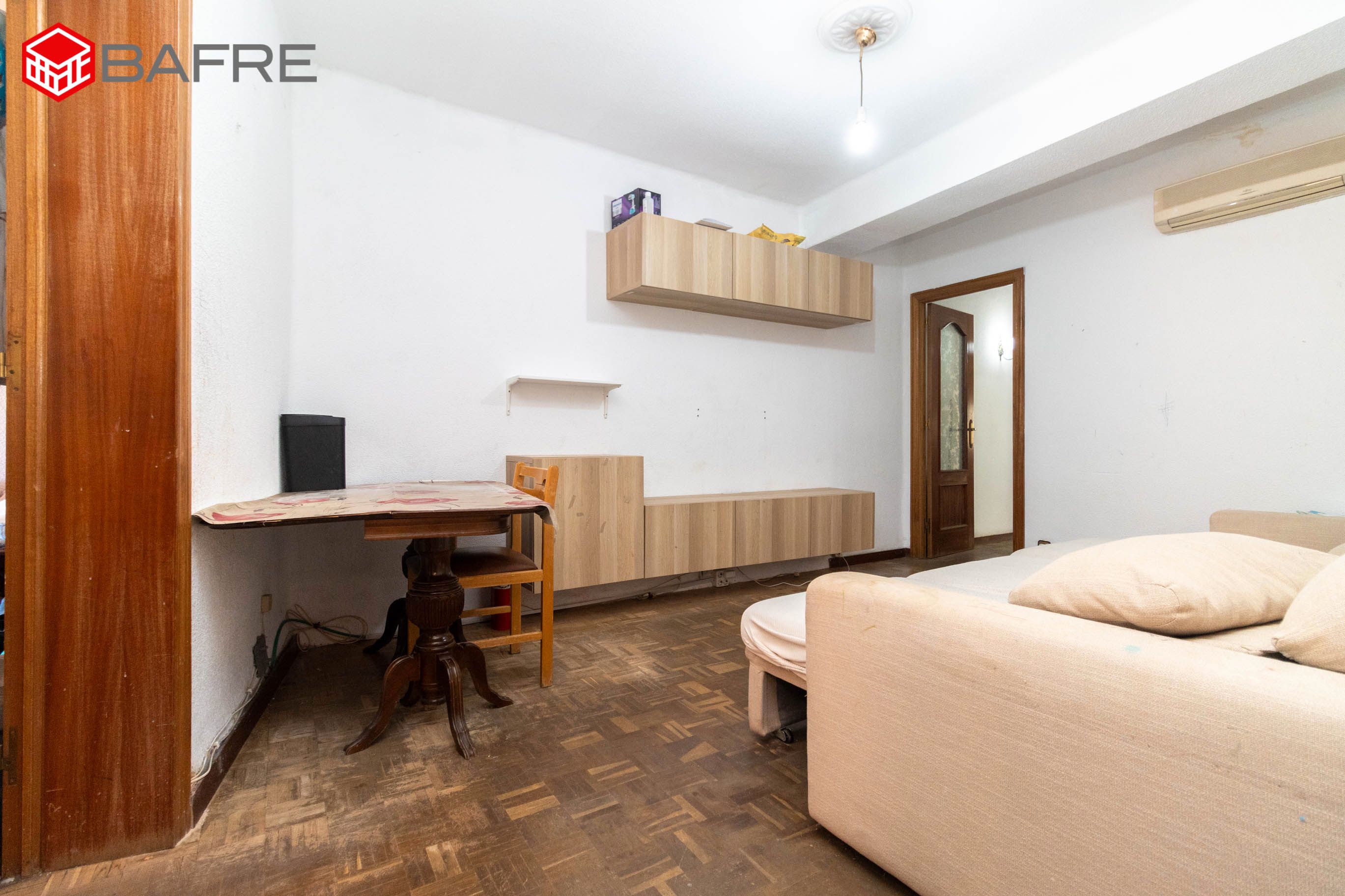 Living room of Flat for sale in  Madrid Capital  with Air Conditioner and Balcony