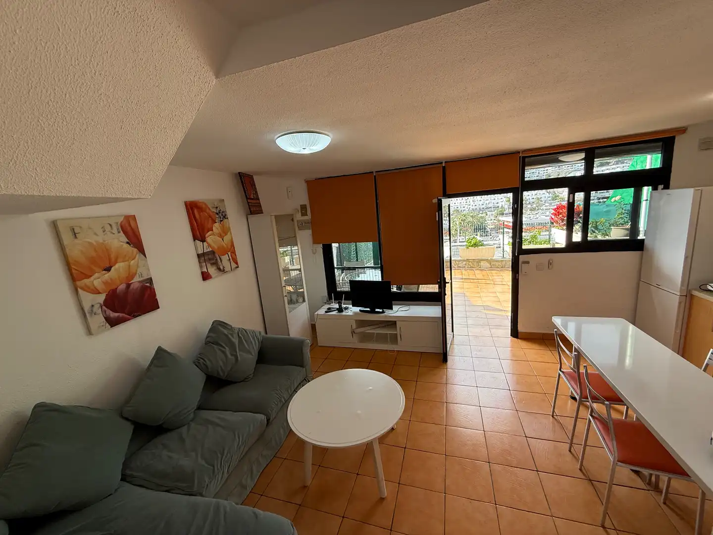 Sala d'estar de Casa adosada en venda en Mogán amb Jardí privat, Terrassa i Traster