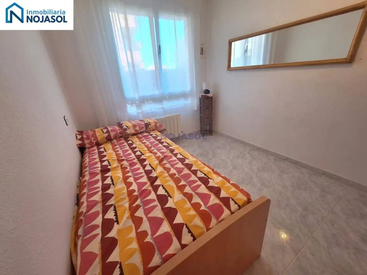 Dormitori de Apartament de lloguer en Noja amb Calefacció, Jardí privat i Terrassa