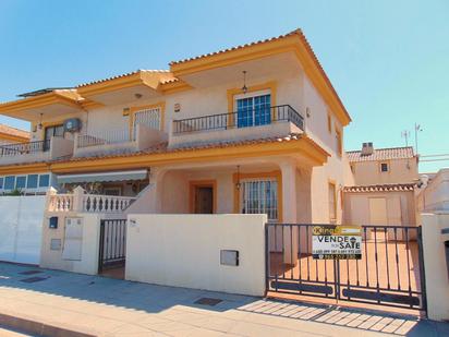 Exterior view of Single-family semi-detached for sale in Pilar de la Horadada  with Private garden, Terrace and Furnished