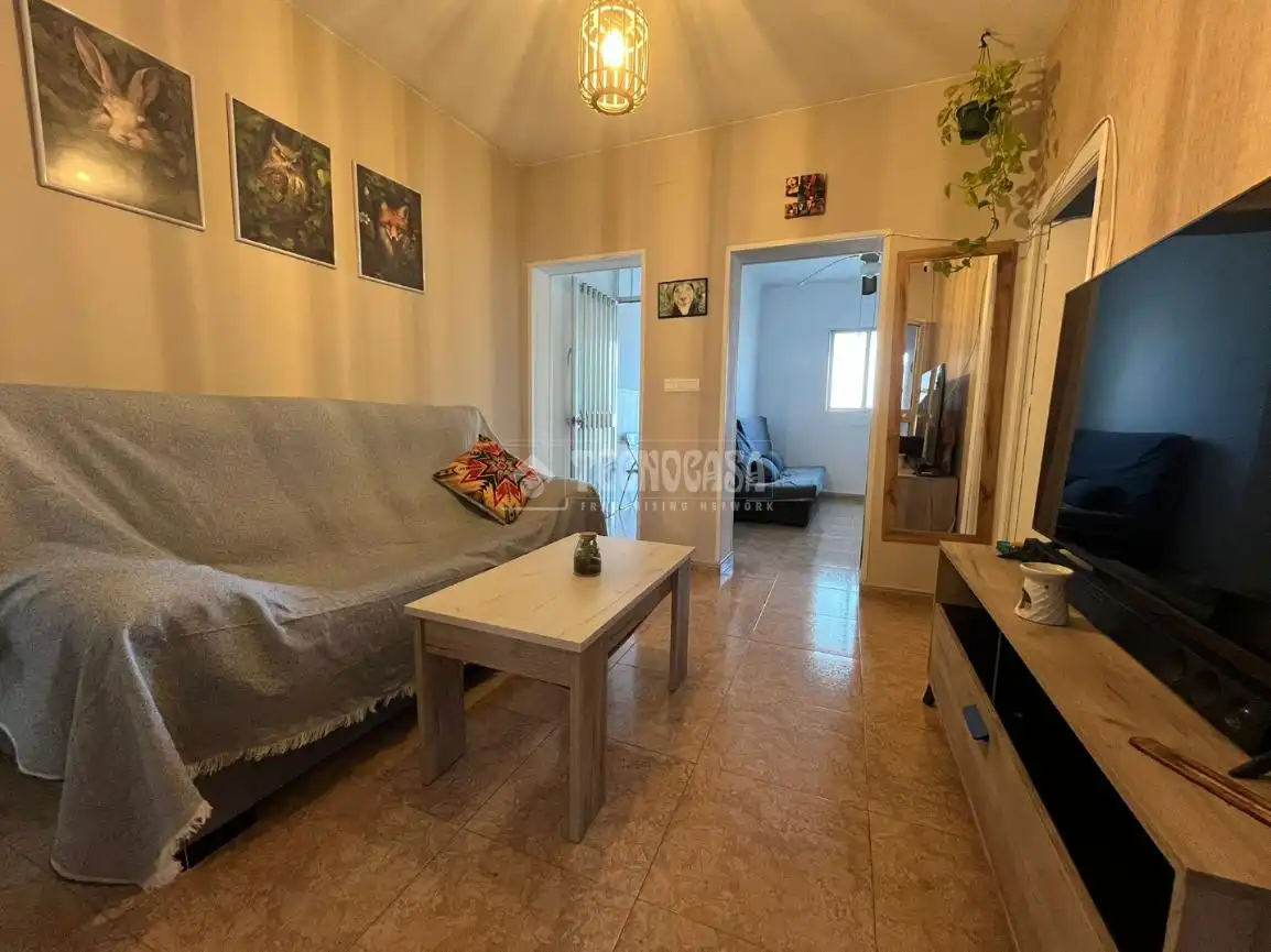 Sala de estar de Casa adosada en venta en Dos Hermanas