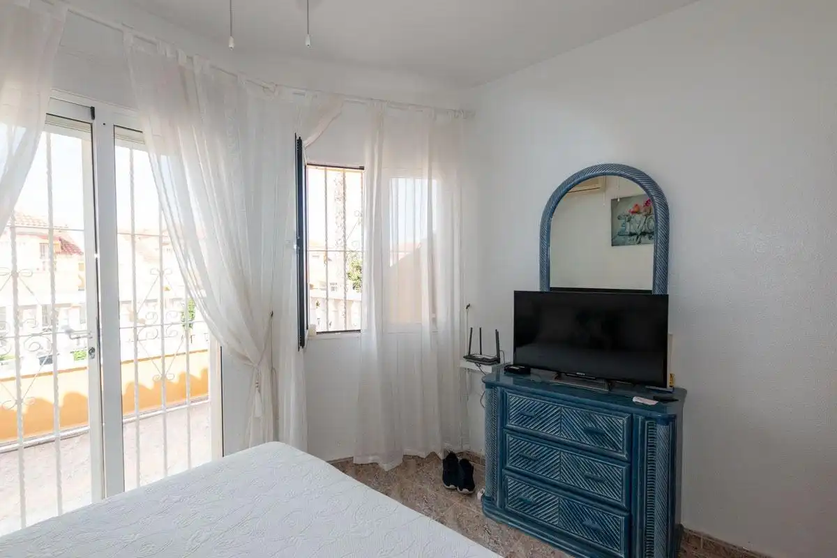 Dormitori de Casa adosada en venda en Orihuela amb Jardí privat, Terrassa i Piscina comunitària