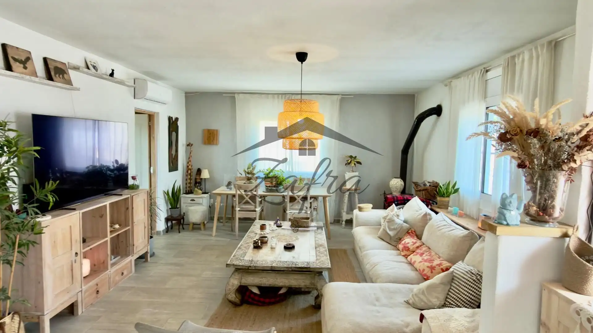 Sala d'estar de Casa o xalet en venda en Tordera amb Aire condicionat, Jardí privat i Terrassa
