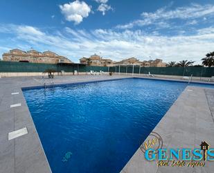 Swimming pool of Single-family semi-detached for sale in Torrevieja  with Air Conditioner, Heating and Terrace