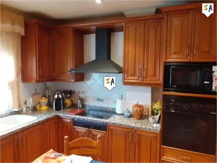 Cuina de Casa adosada en venda en Iznájar amb Aire condicionat, Terrassa i Traster