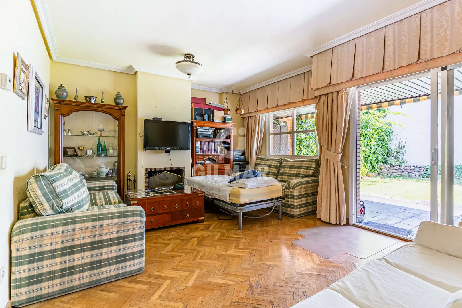 Sala de estar de Casa adosada en venta en Madrid con Calefacción y Jardín privado