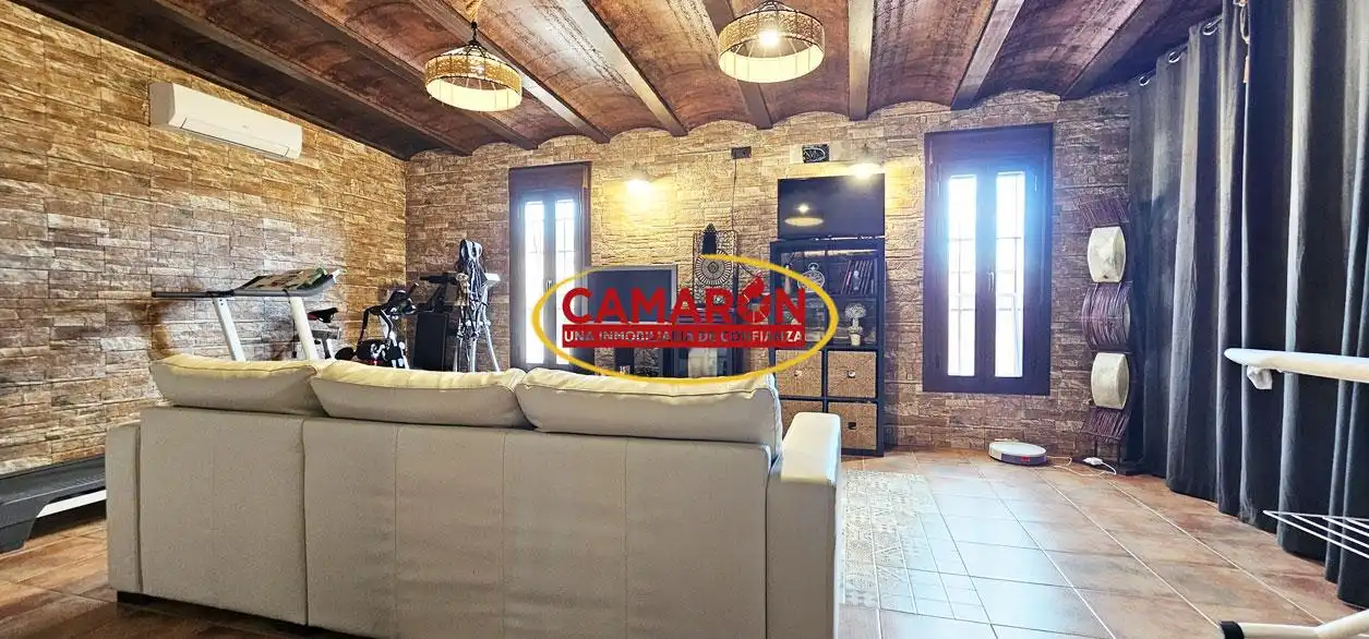 Sala d'estar de Casa o xalet en venda en Coria del Río amb Aire condicionat